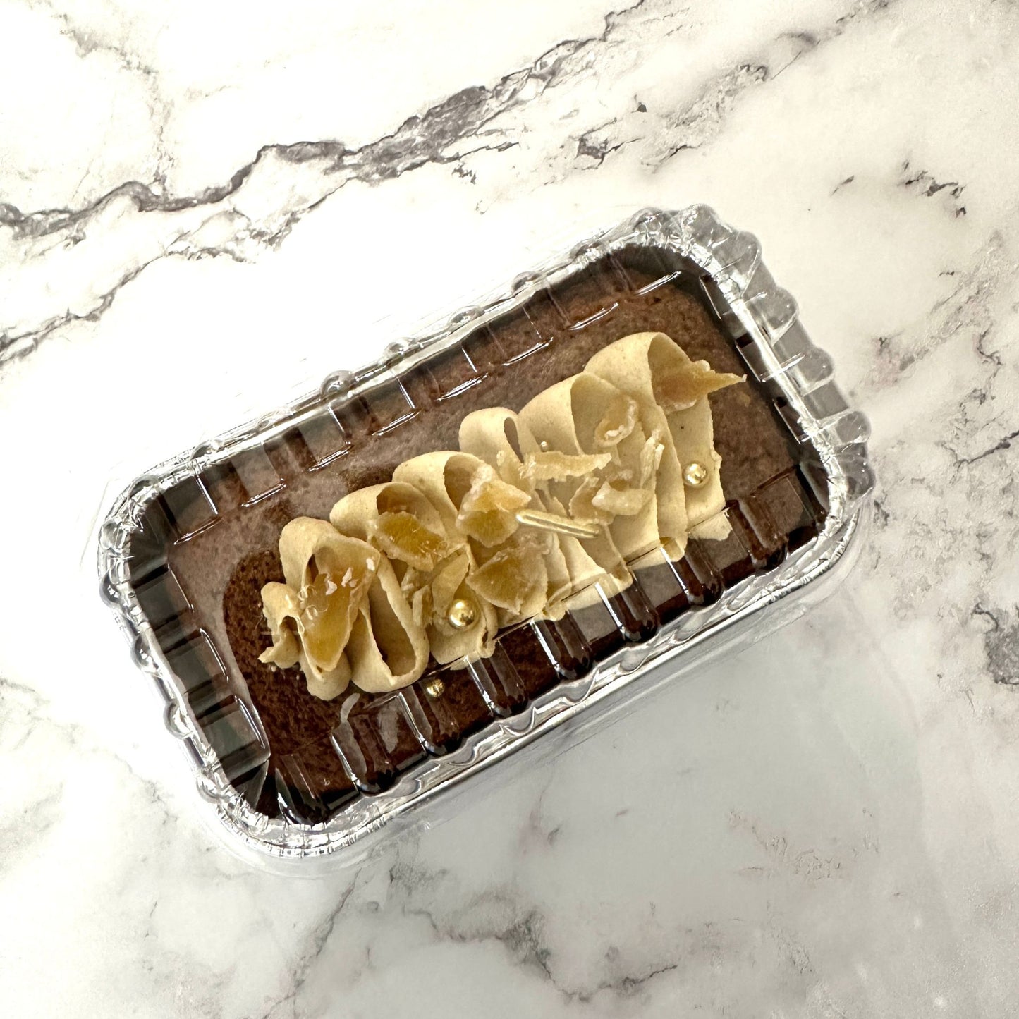 Small jamaican ginger cake with a maple ginger buttercream