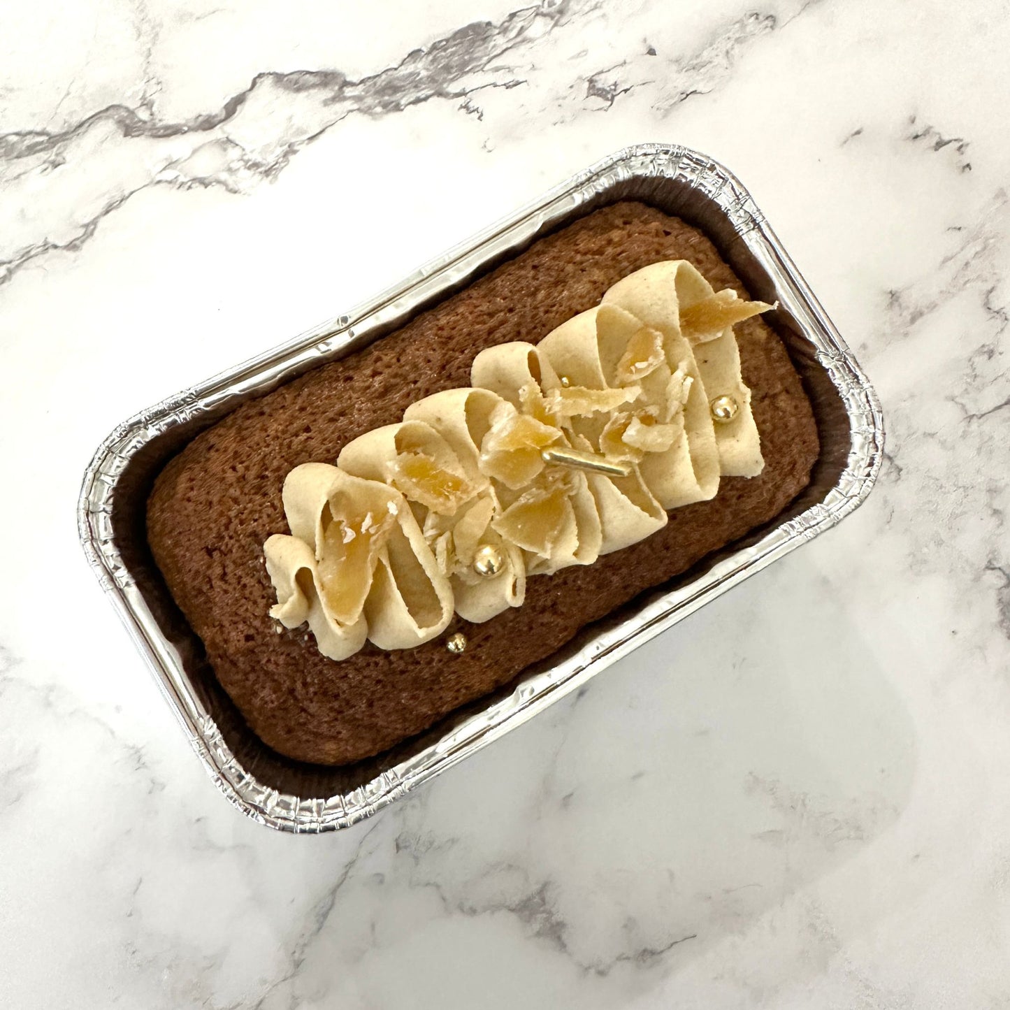 Small jamaican ginger cake with a maple ginger buttercream